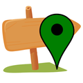 A green map location pin icon superimposed over a blank wooden arrow signpost on a patch of grass.