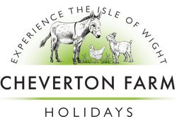Logo for Cheverton Farm Holidays featuring an illustration of a donkey, chicken, and goat with text about Isle of Wight.