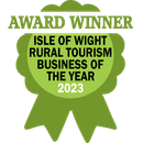 A green award badge that reads 