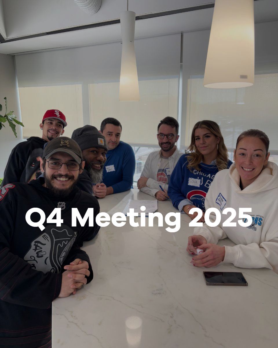 Team meeting around a white table in a bright office, with “Q4 Meeting 2025” overlaid.