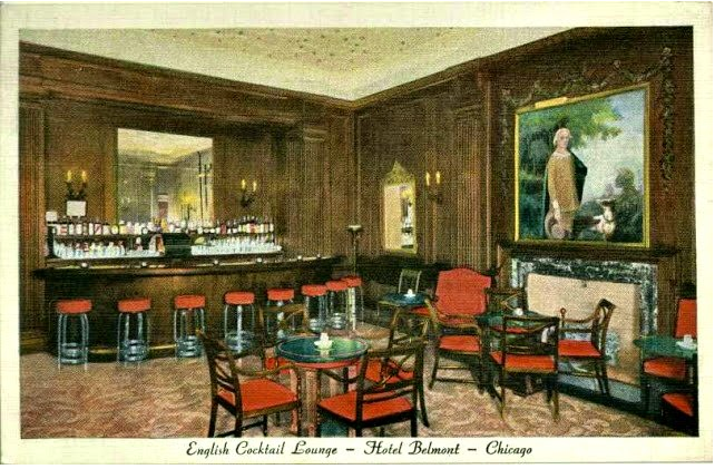 A room with tables and chairs and a painting on the wall