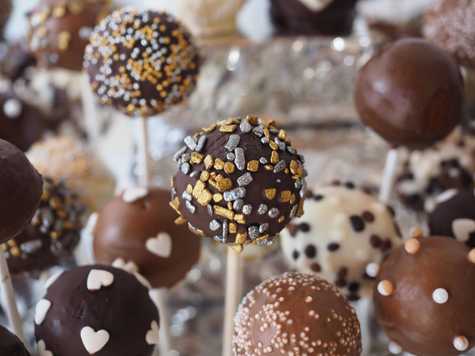 A lot of chocolate coded lollipop.