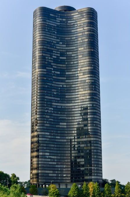 A tall building with a blue sky in the background