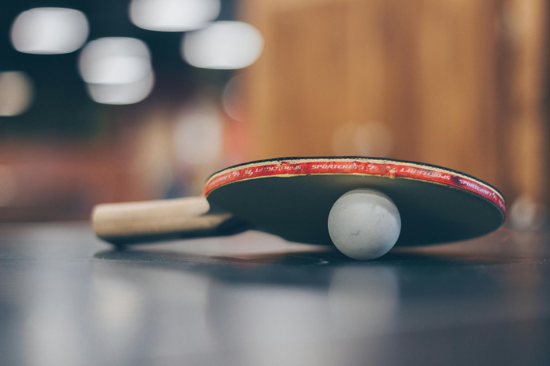 A ping-pong ball and a paddle.