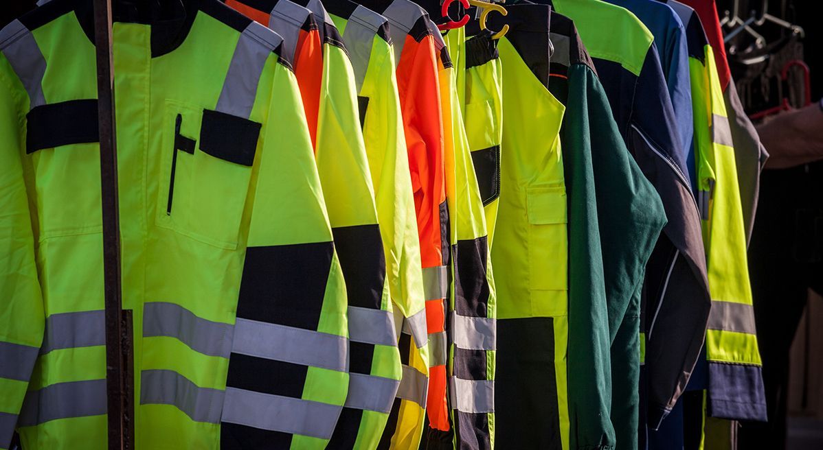 A Row Of Jackets — Coffs Disposals, Workwear, Safety & Boot Centre in Coffs Harbour, NSW