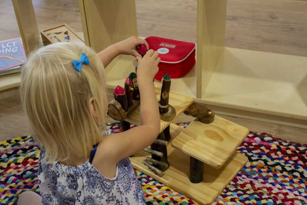 Child playing with toys. Childcare, kindy, Montessori, Gold Coast, Warwick, Jindabyne.