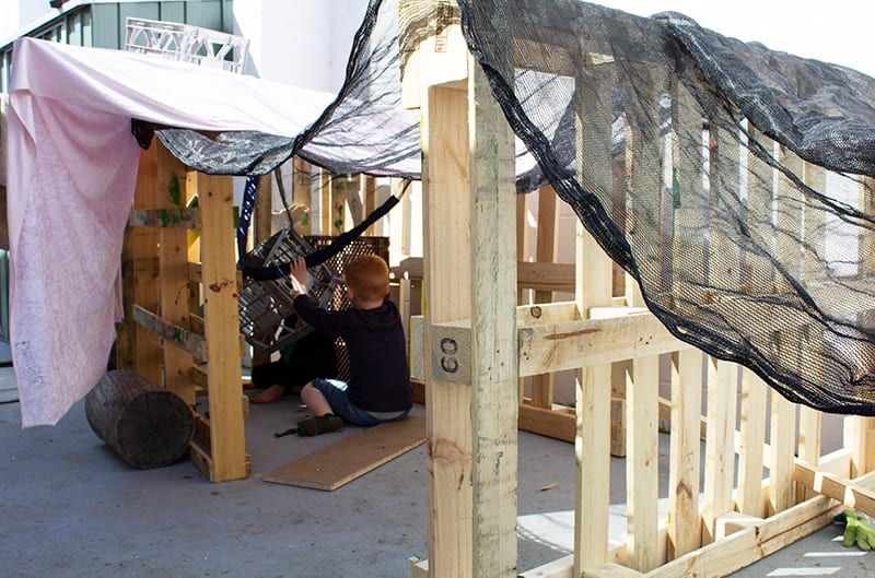 Child playing in a fort. Childcare, kindy, Montessori, Gold Coast, Warwick, Jindabyne.