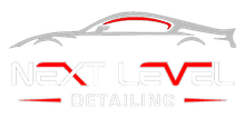 Logo for Next Level Detailing, featuring a car silhouette above the company name in gray and red.