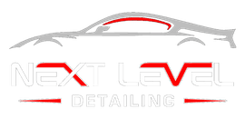 Logo for Next Level Detailing, featuring a car silhouette above the company name in gray and red.