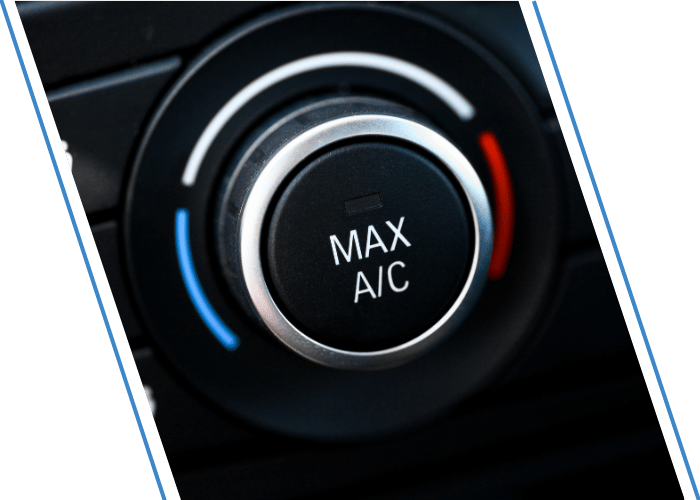 Close-up of a vehicle's climate control dial set to MAX A/C.