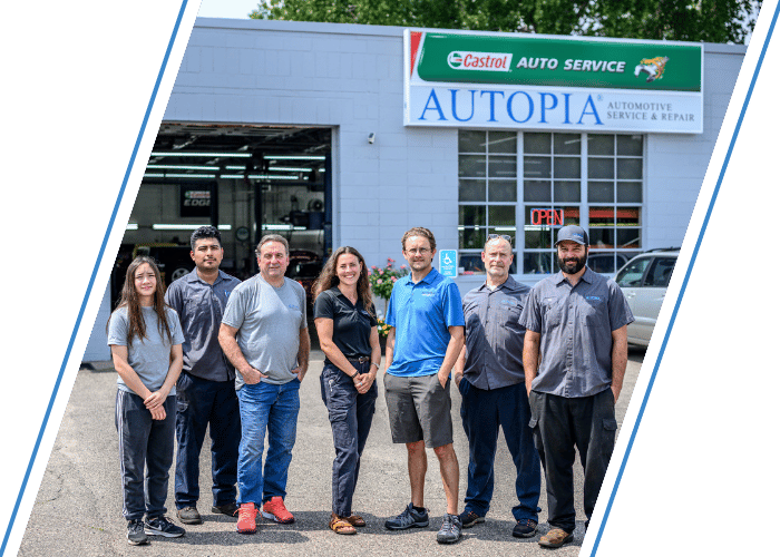 Team standing outside Autopia auto service shop