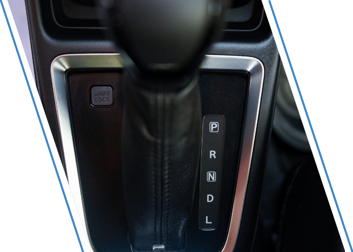 Automatic transmission gear selector inside a vehicle.