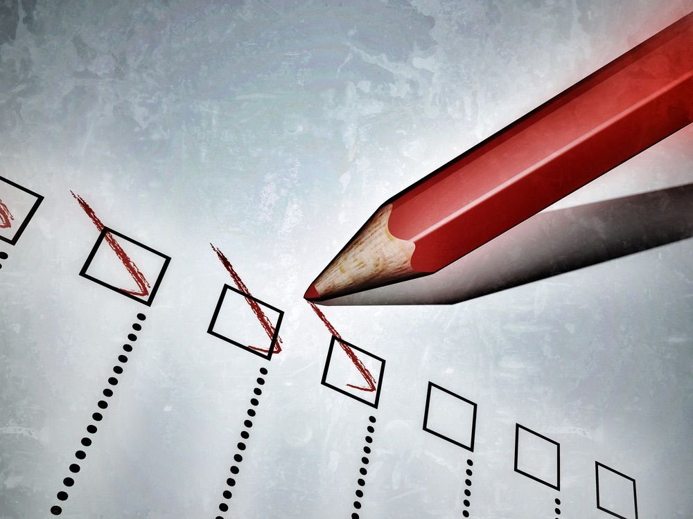 A Red Pencil Is Marking a Check Mark on A Checklist — Hager Surveying In Kyogle, NSW