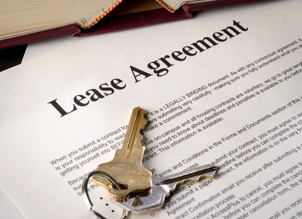 A Lease Agreement with Keys on Top of It — Hager Surveying In Coolangatta, QLD