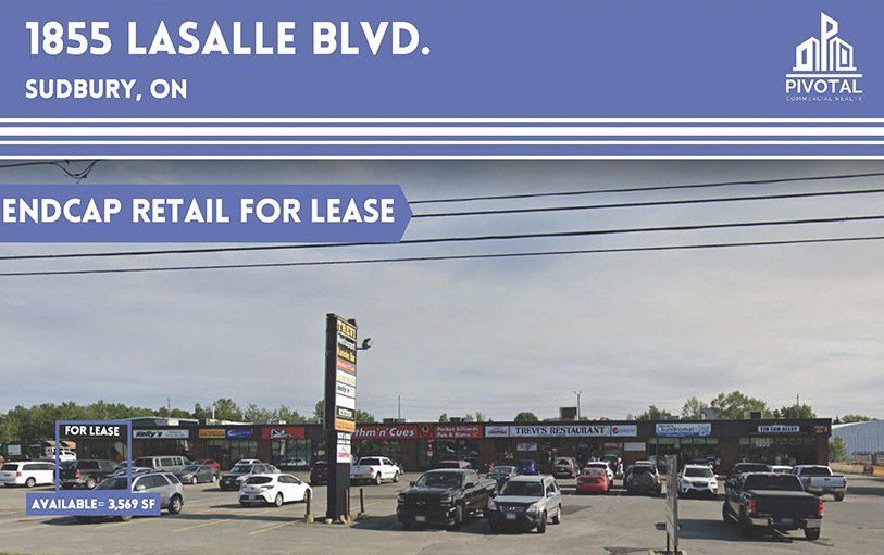 Retail property for lease at 1855 LaSalle Blvd. in Sudbury, ON, showing a strip mall with a parking lot.