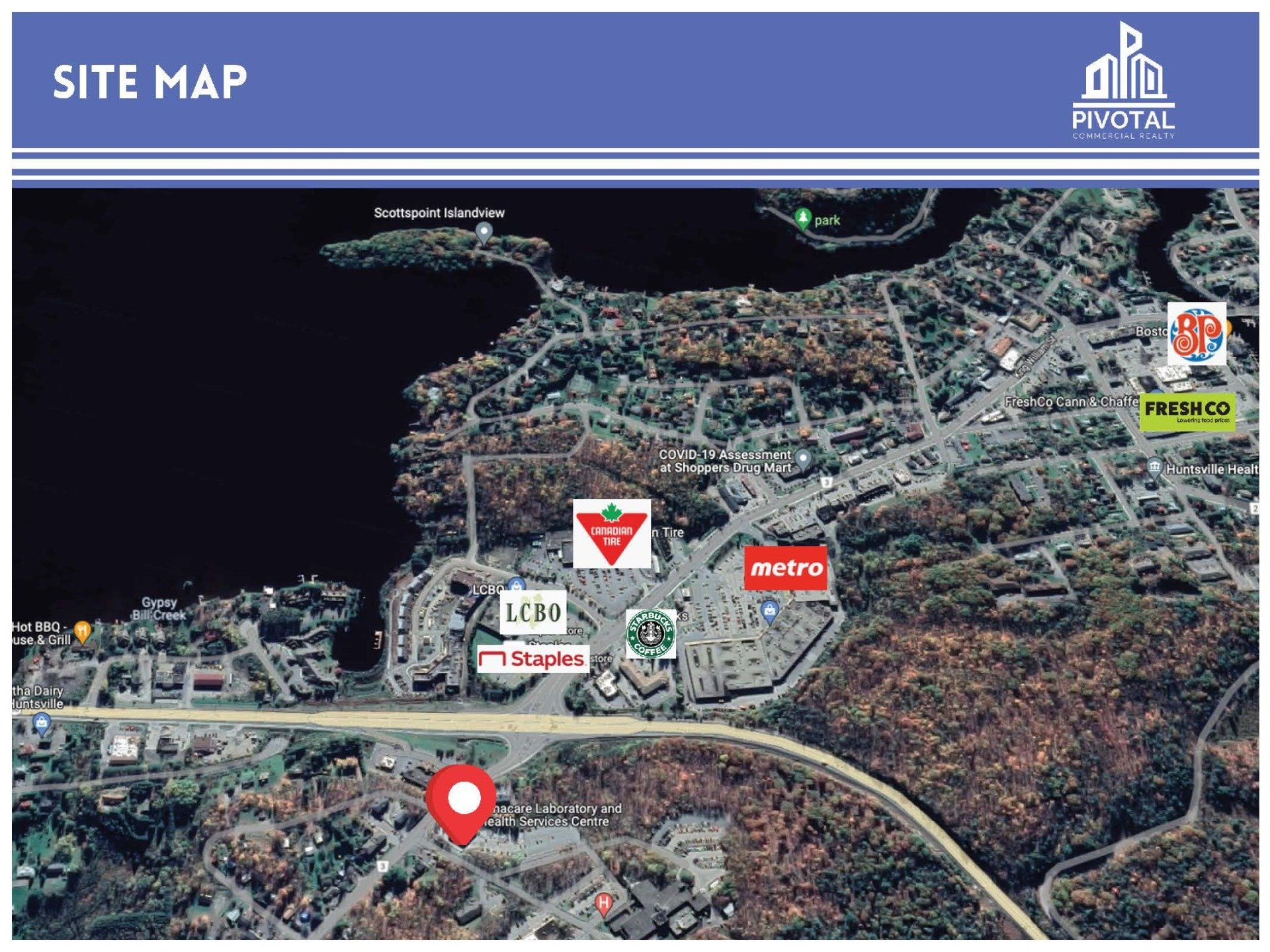 A satellite view map showing commercial businesses and a red pin marking a location near a waterfront area.