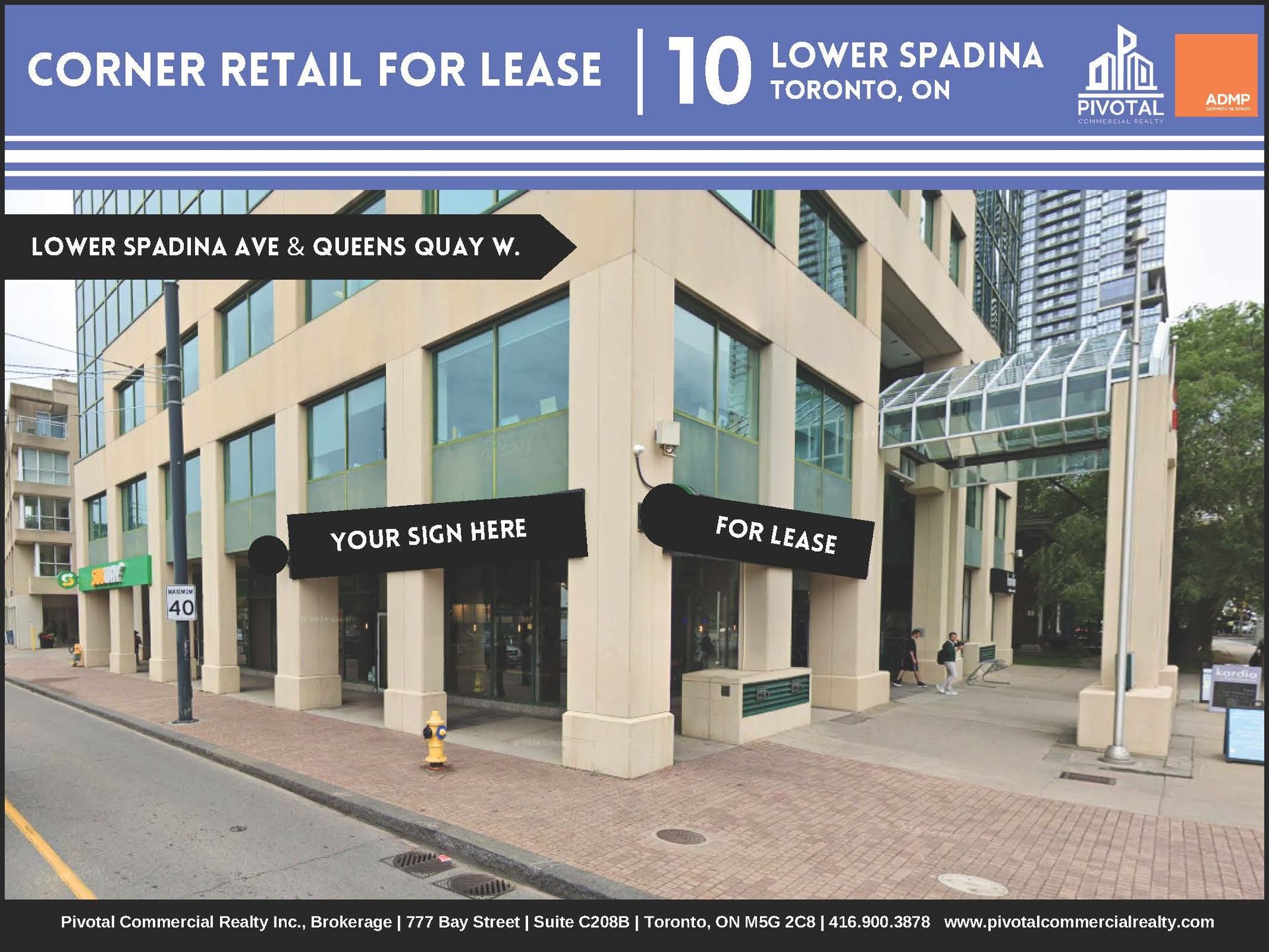 Corner retail space for lease at 10 Lower Spadina Avenue and Queens Quay West in Toronto, featuring large storefront signs.
