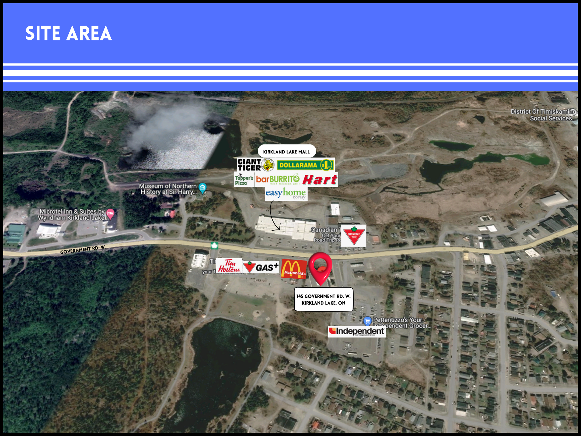 Aerial map of a retail area with store logos and a red location pin, centered on a shopping complex and adjacent roads.