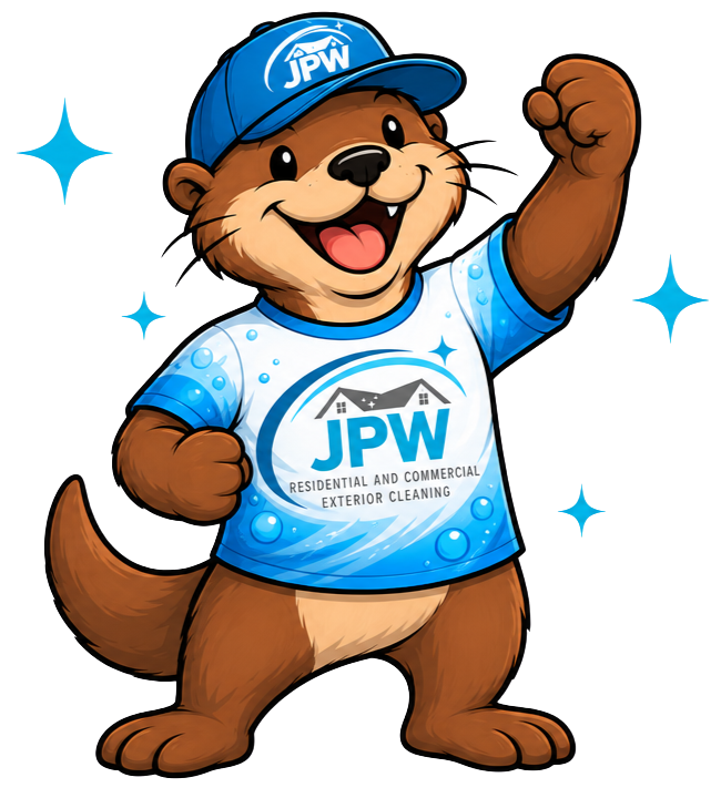 Cartoon beaver mascot in a blue JPW cap and shirt, smiling and flexing a fist