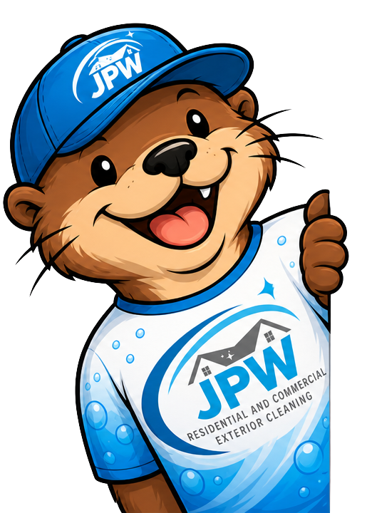 Smiling otter mascot in a blue JPN cap and shirt, giving a thumbs-up.