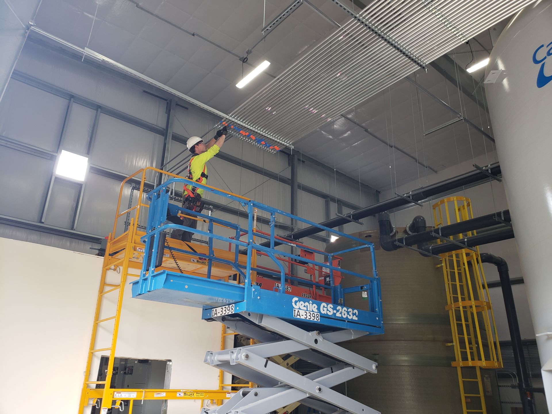 EMT conduit installed over a motor control center