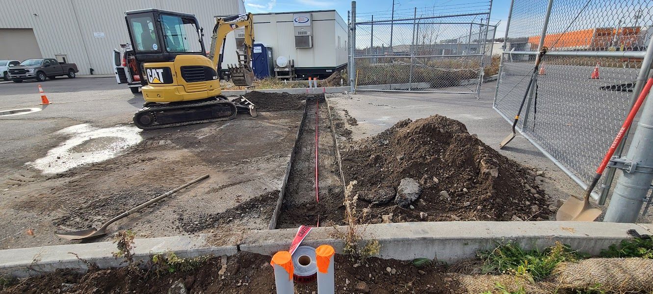 Self-performed conduit installation under a road