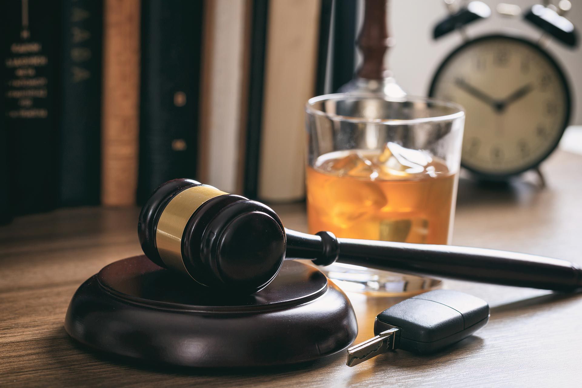 DUI lawyer reviewing case documents with a client. DUI lawyer reviewing case documents with a client.
