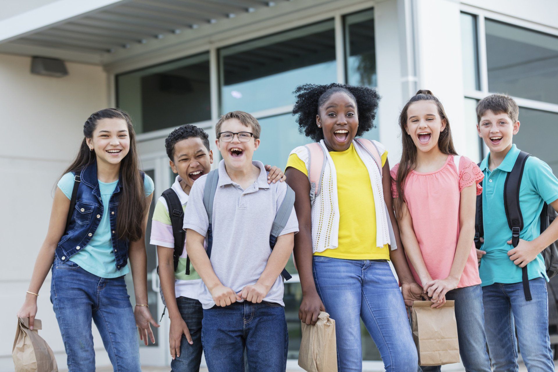 Group of kids smiling — Daytona Beach, FL — Monarch Academy