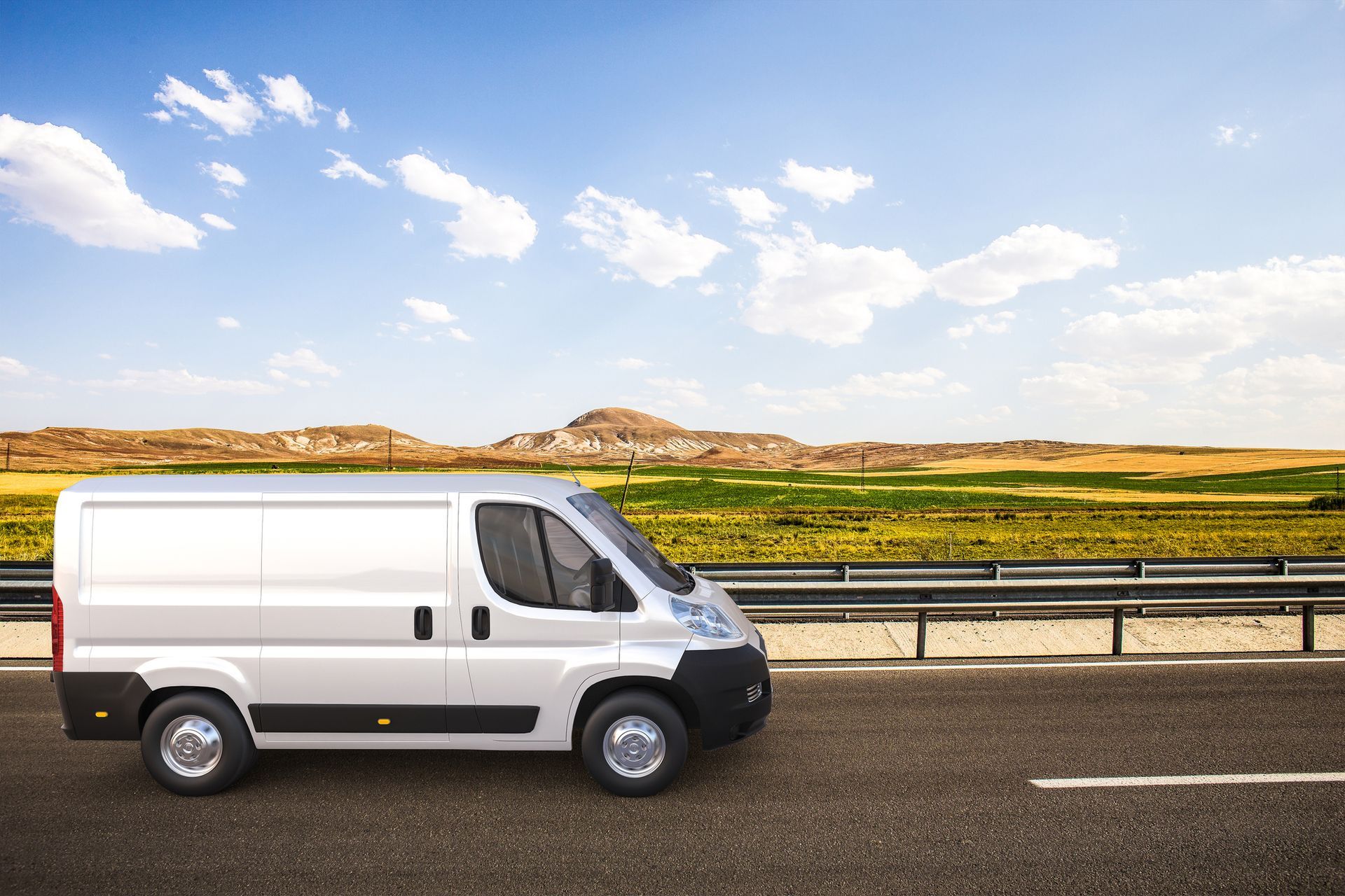 A white van on a road | Transportation Service in The Villages FL