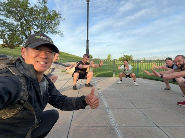 Outdoor group workout at sunrise