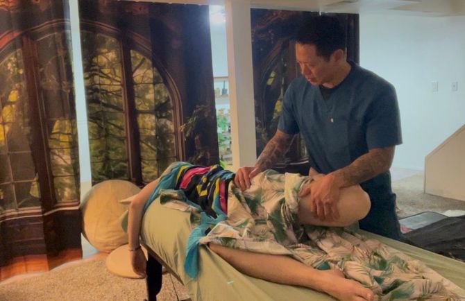 Manual therapy session outdoors