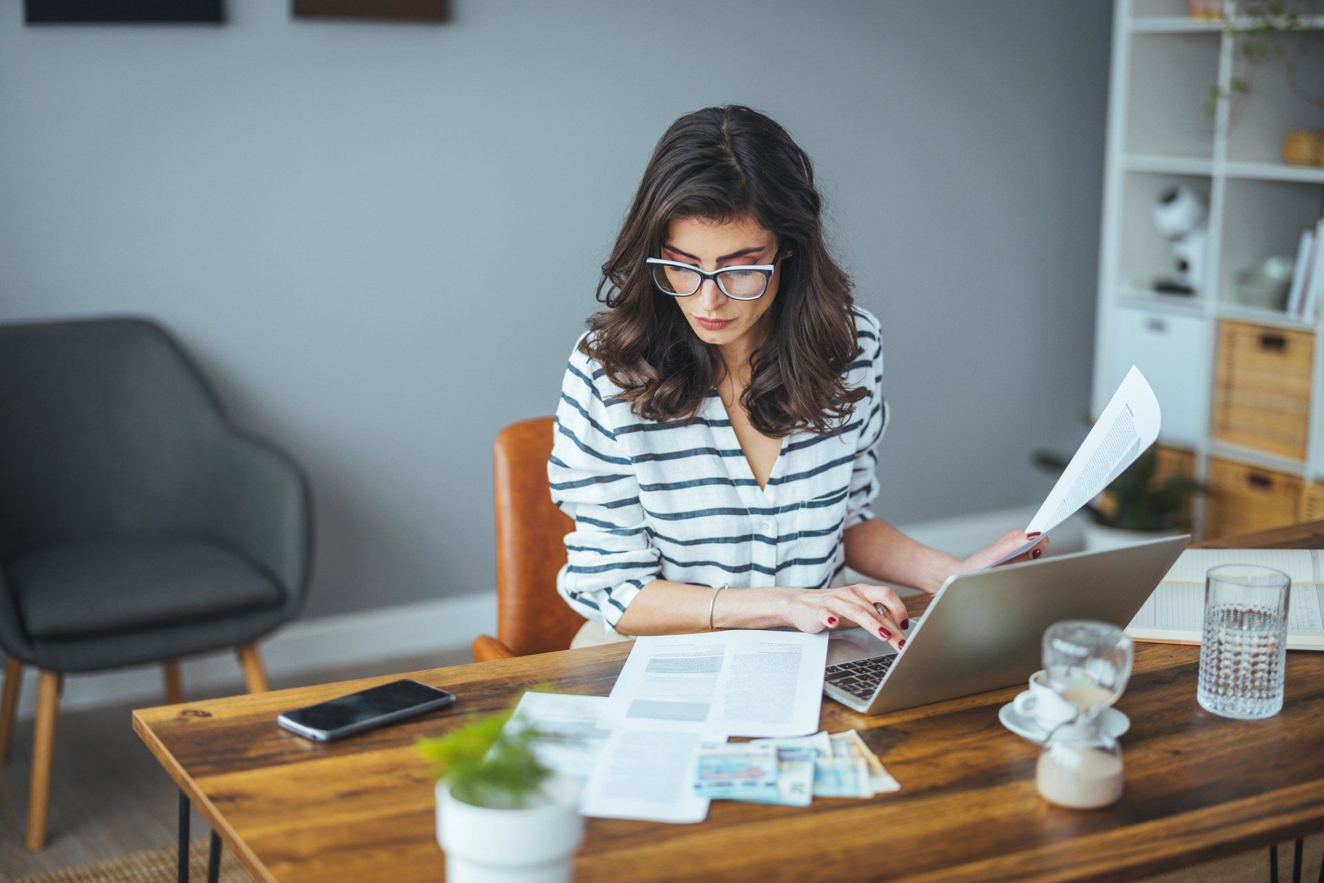 Woman Looking on her Expenses - Clovis, CA - Blankenship & Company