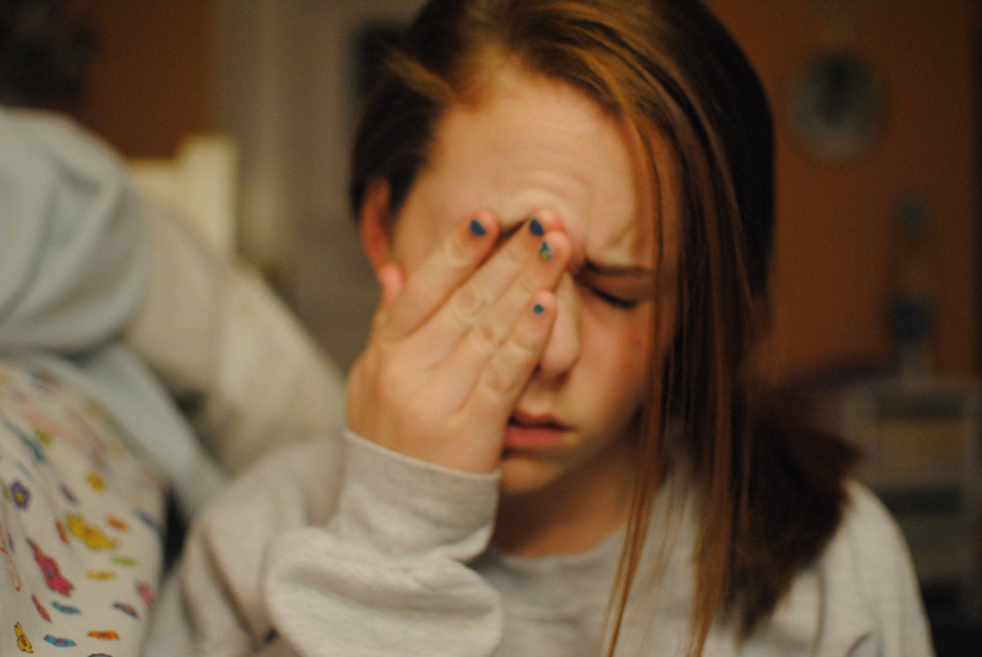 A woman rubbing her eye in Clarksville, TN