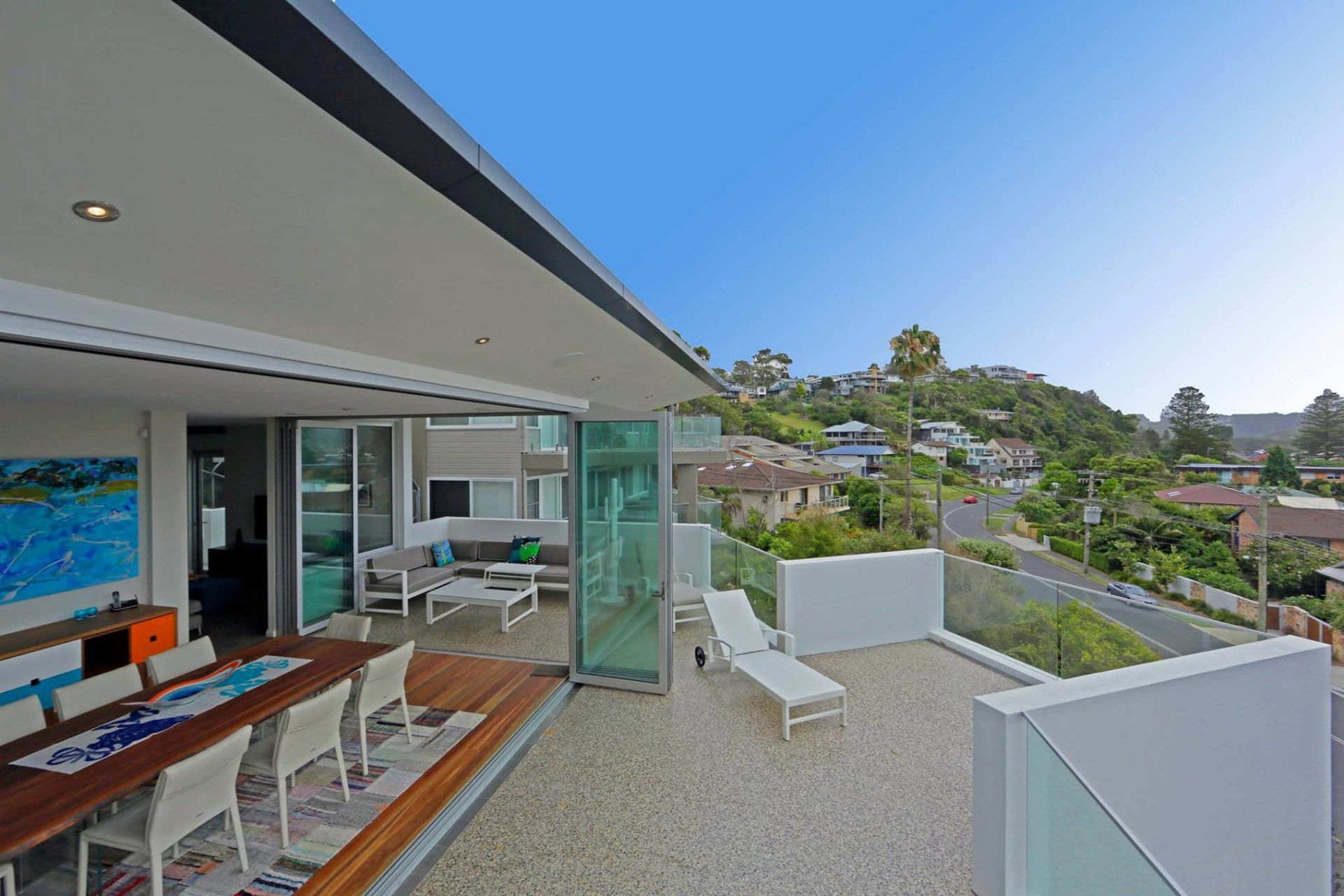 Outdoor Patio With a View of Houses and a Road — S D Maintenance In Avoca, NSW