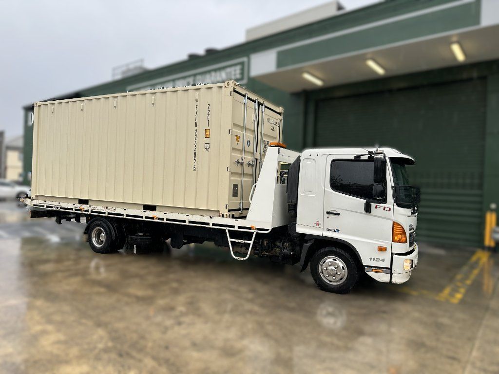White Cargo Truck Parked Outside a Warehouse — Connect Trailers and Towing Pty Ltd In Prospect Vale, TAS