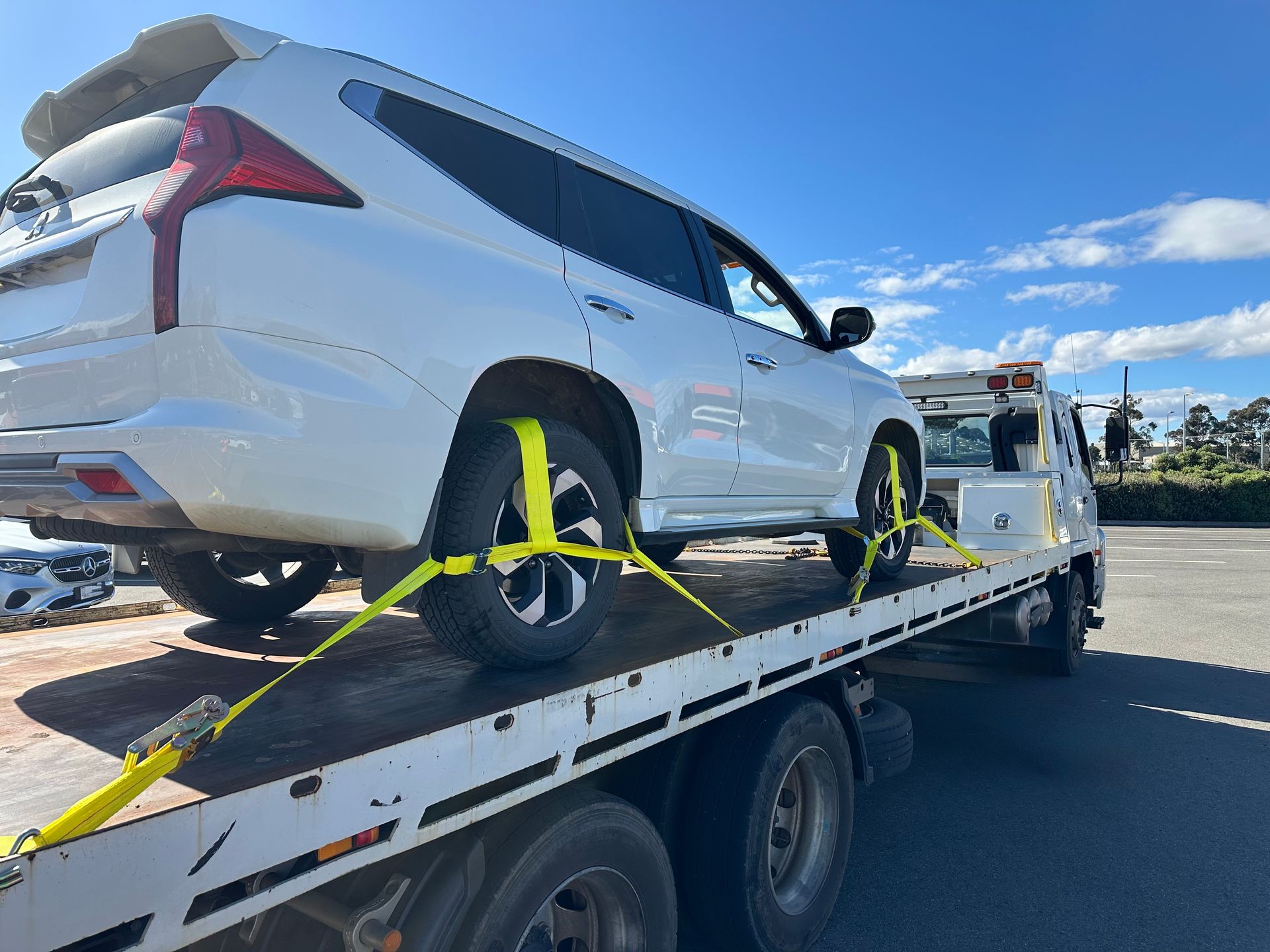 White SUV on a Flatbed Tow Truck — Connect Trailers and Towing Pty Ltd In Prospect Vale, TAS 