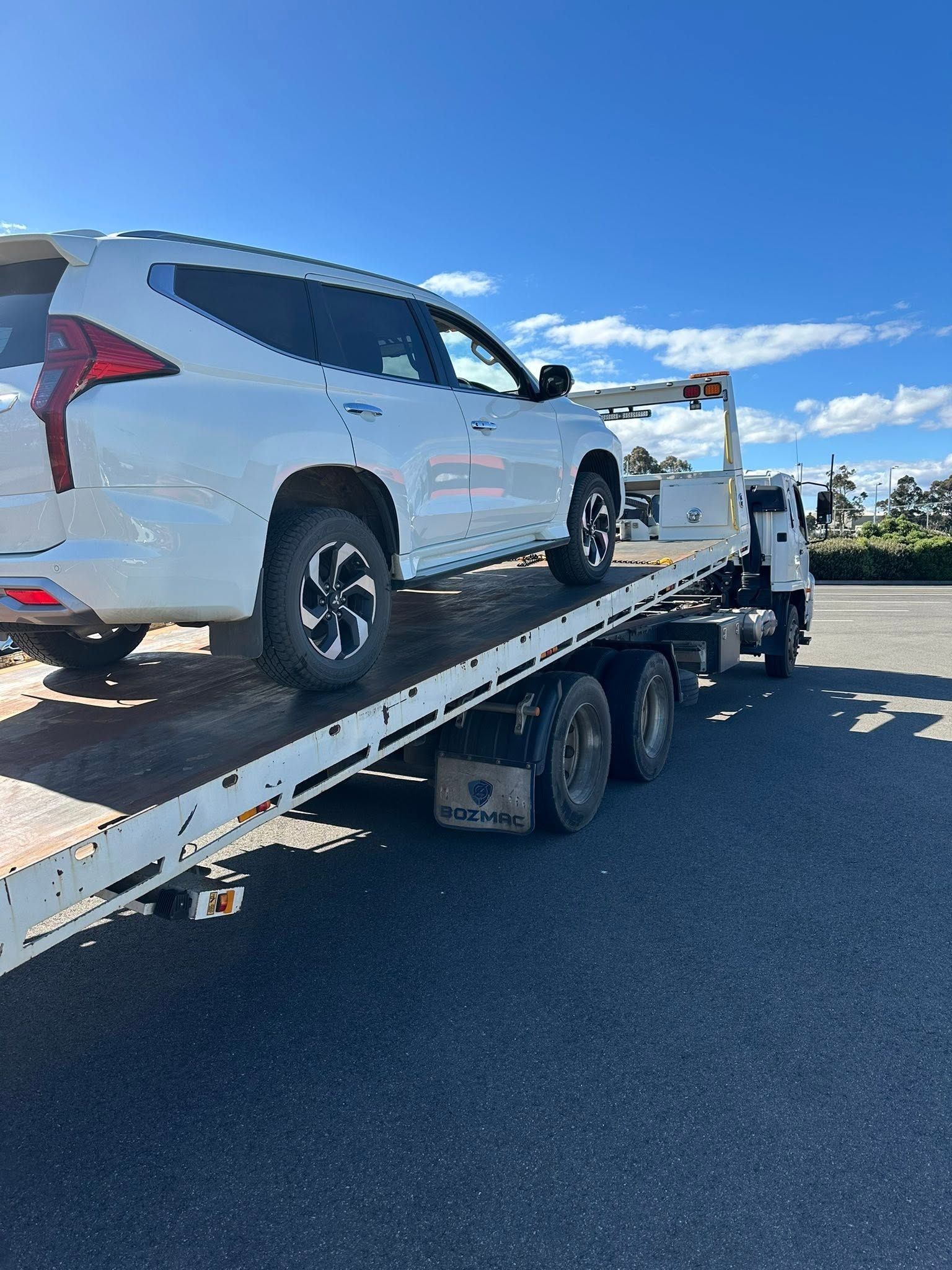 SUV on a Tow Truck — Connect Trailers and Towing Pty Ltd In Prospect Vale, TAS