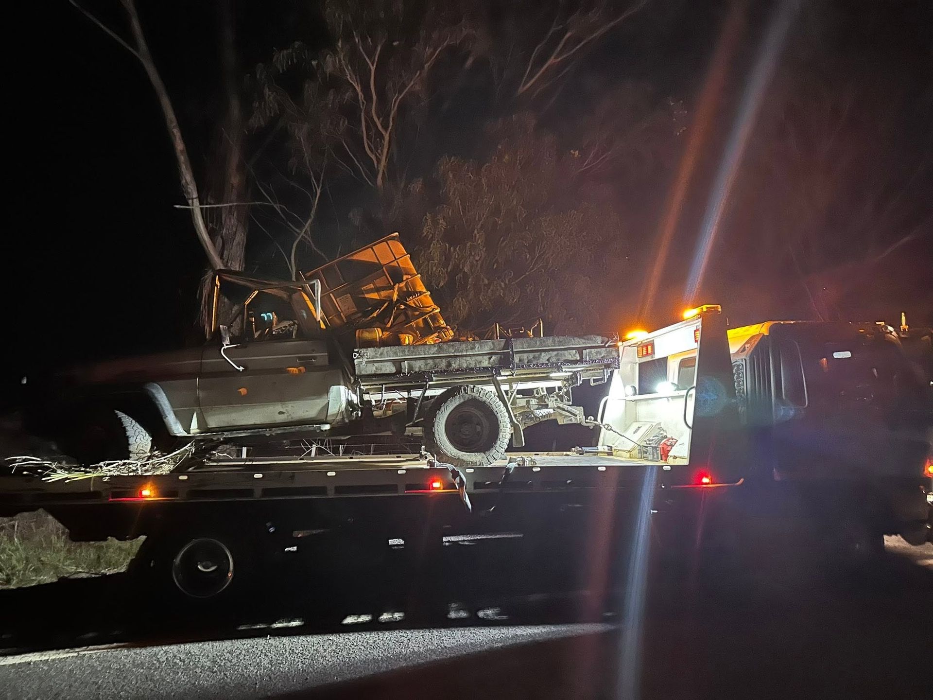Burned Vehicle on A Tow Truck — Connect Trailers and Towing Pty Ltd In Prospect Vale, TAS 