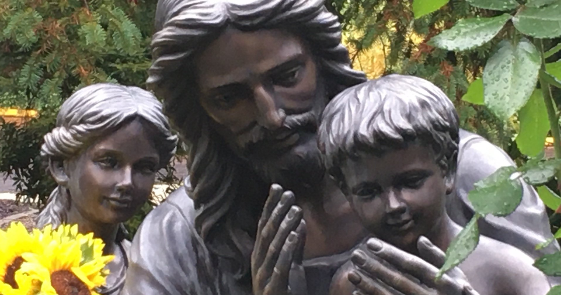 Link to: 2024 Annual Report
Image: Statue of Jesus and children