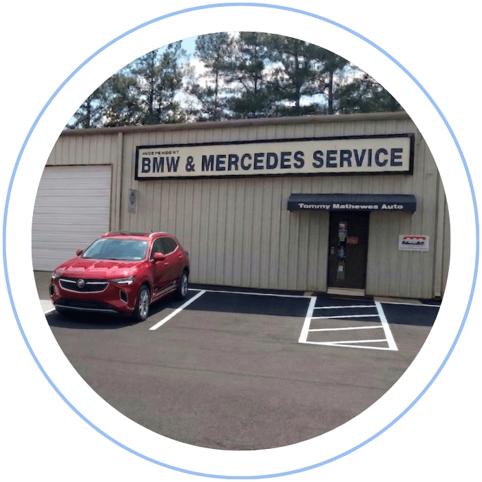 Buick SUV parked in front of Tommy Mathewes Auto Repair