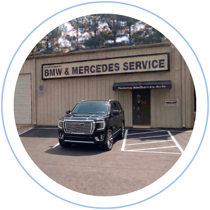GMC SUV parked in front of Tommy Mathewes Auto Repair