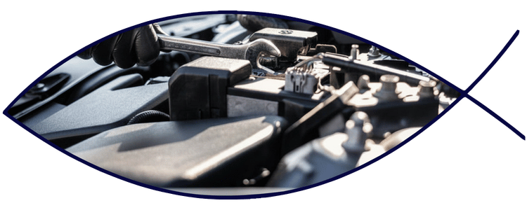 General vehicle maintenance with tools in engine bay