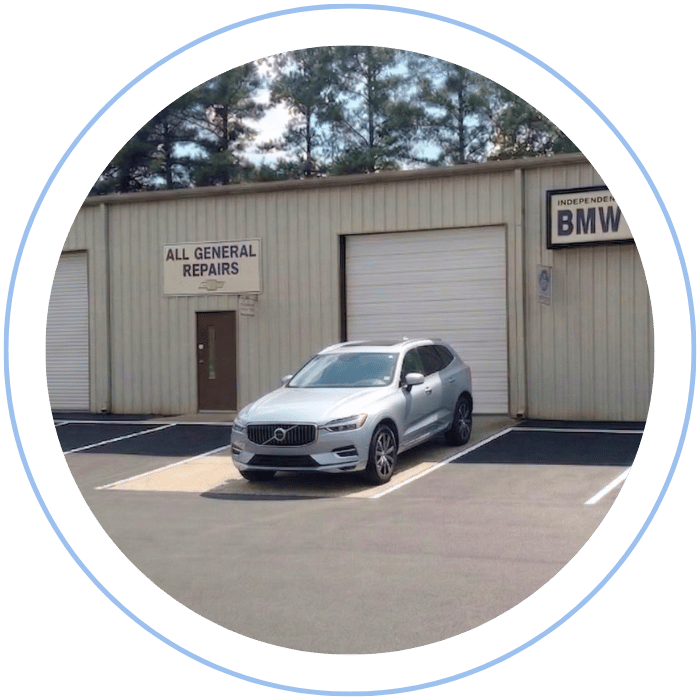 Volvo SUV parked in front of Tommy Mathewes Auto Repair