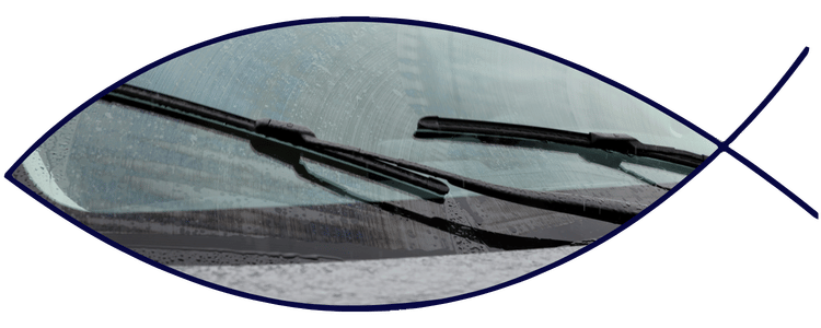 Windshield wipers clearing rain from glass