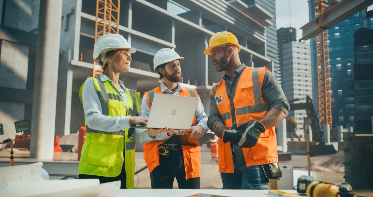 Construction crew talking on a work site
