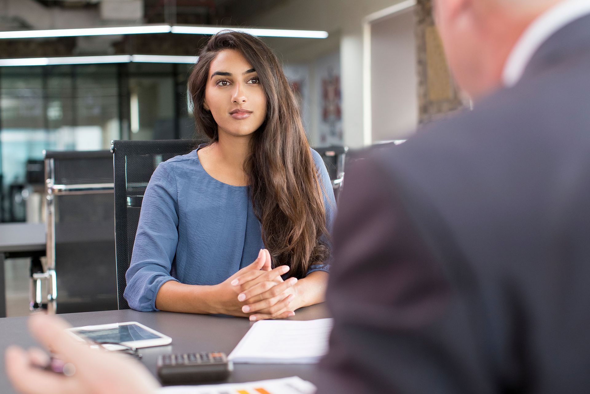 Man having an interview with a business woman