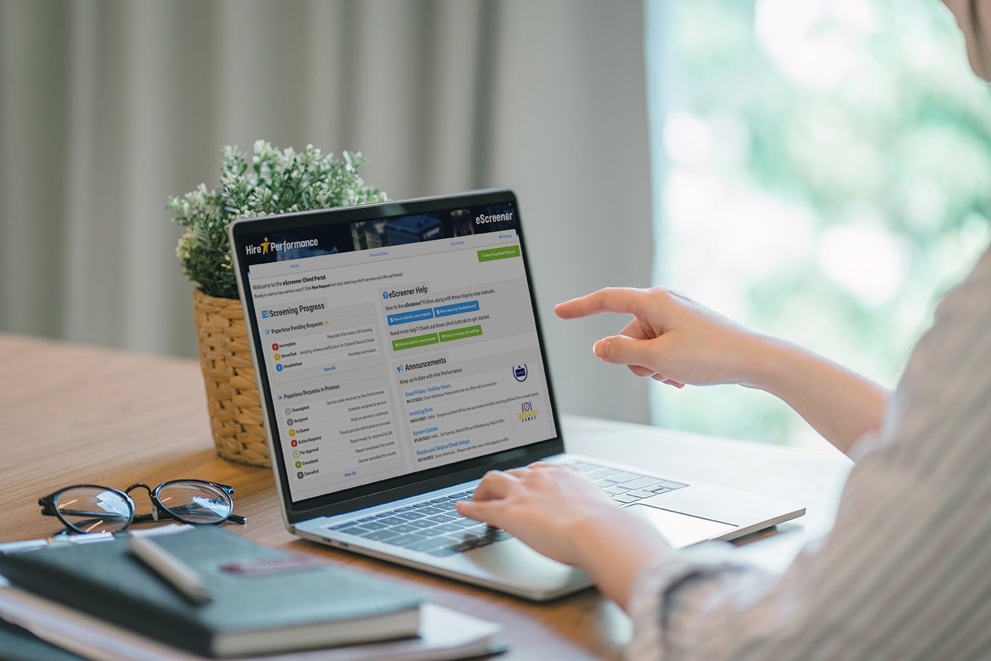 HR on laptop requesting a criminal record check