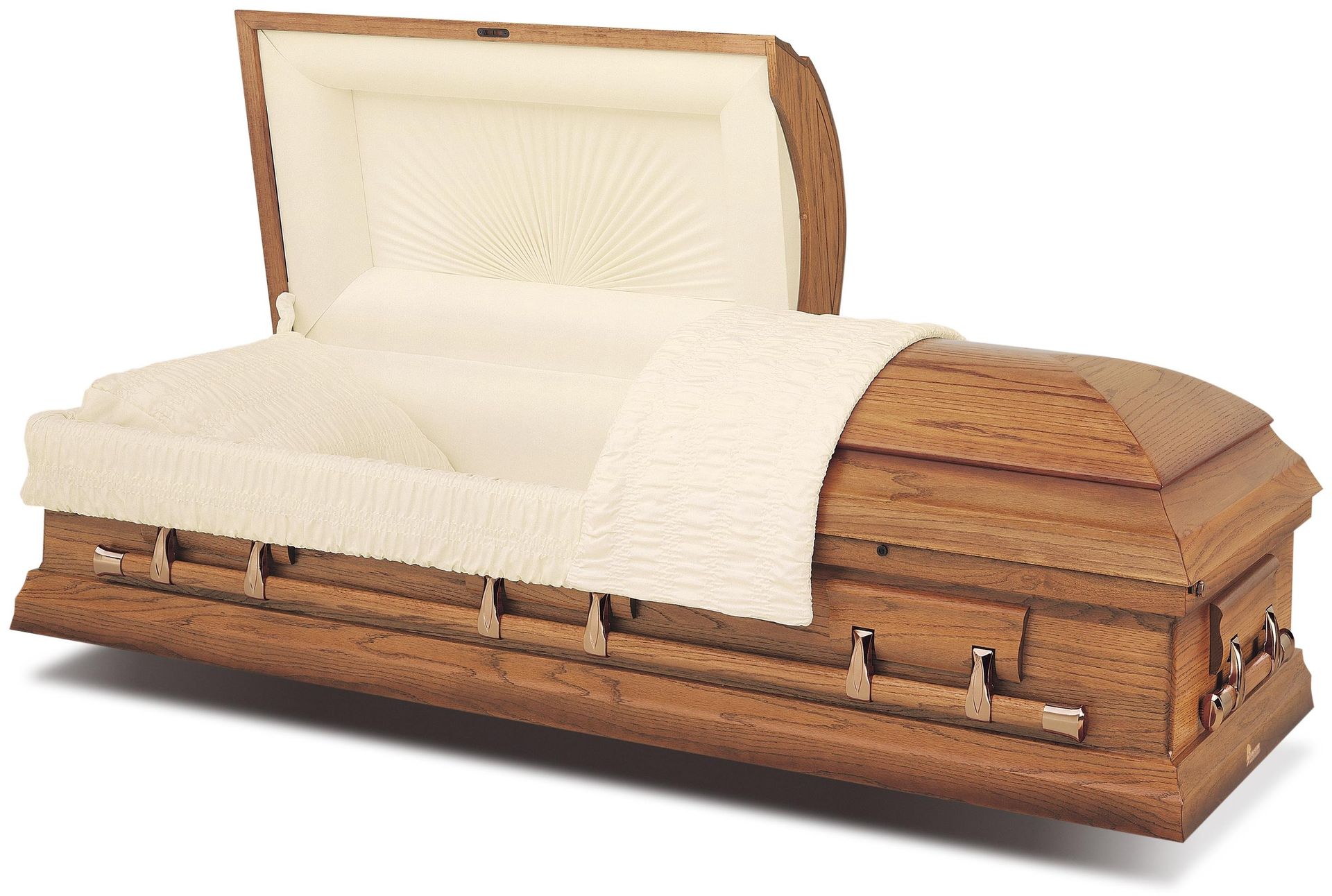 Wooden casket with white lining and draped white cloth on a plain background