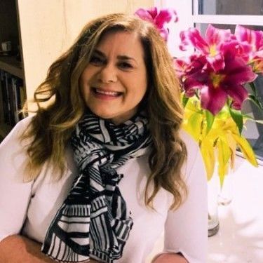 Woman Smiling And Flowers - Adult Therapy on Wurtulla, QLD