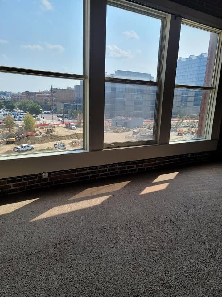 Office maintenance Omaha commercial conference room with clean carpet